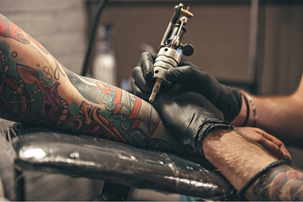 John McAfee Gets New Tattoo for Skycoin Promotion