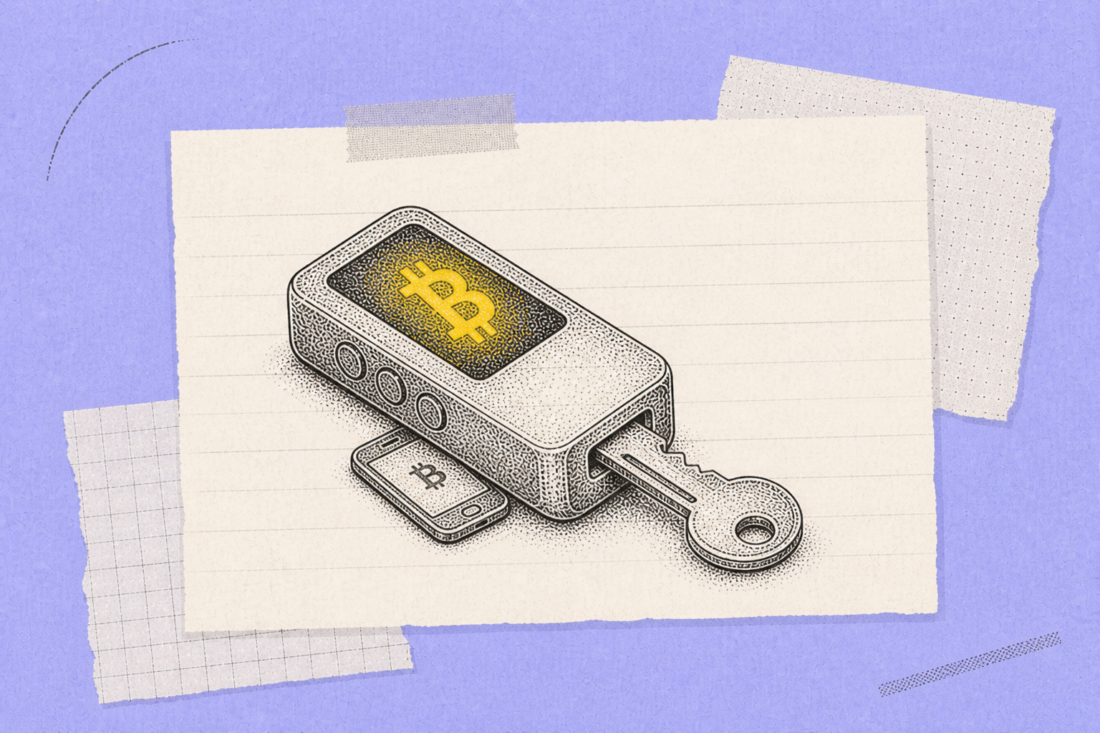 Hardware Bitcoin wallet beside smartphone hot wallet setup